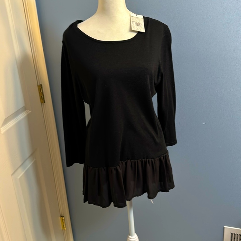 NWT ladies super cute light weight sweater with peplum waist size L